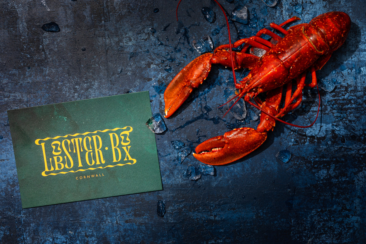 Lobster on slate with the Lobster Box card