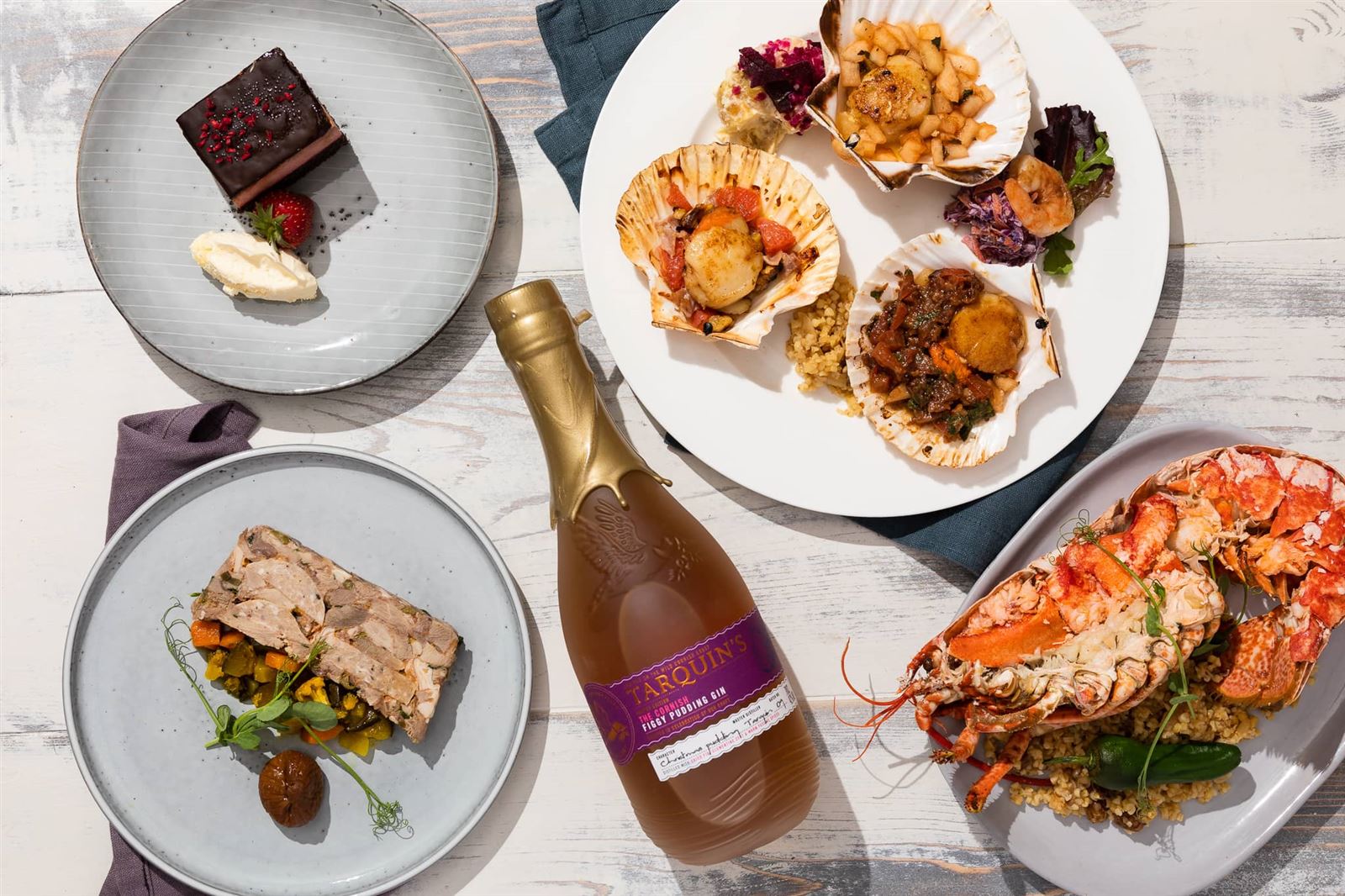 Scallops, lobster and a glass of wine