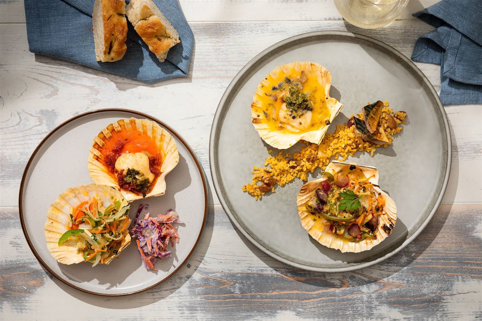 King scallops on grey plates